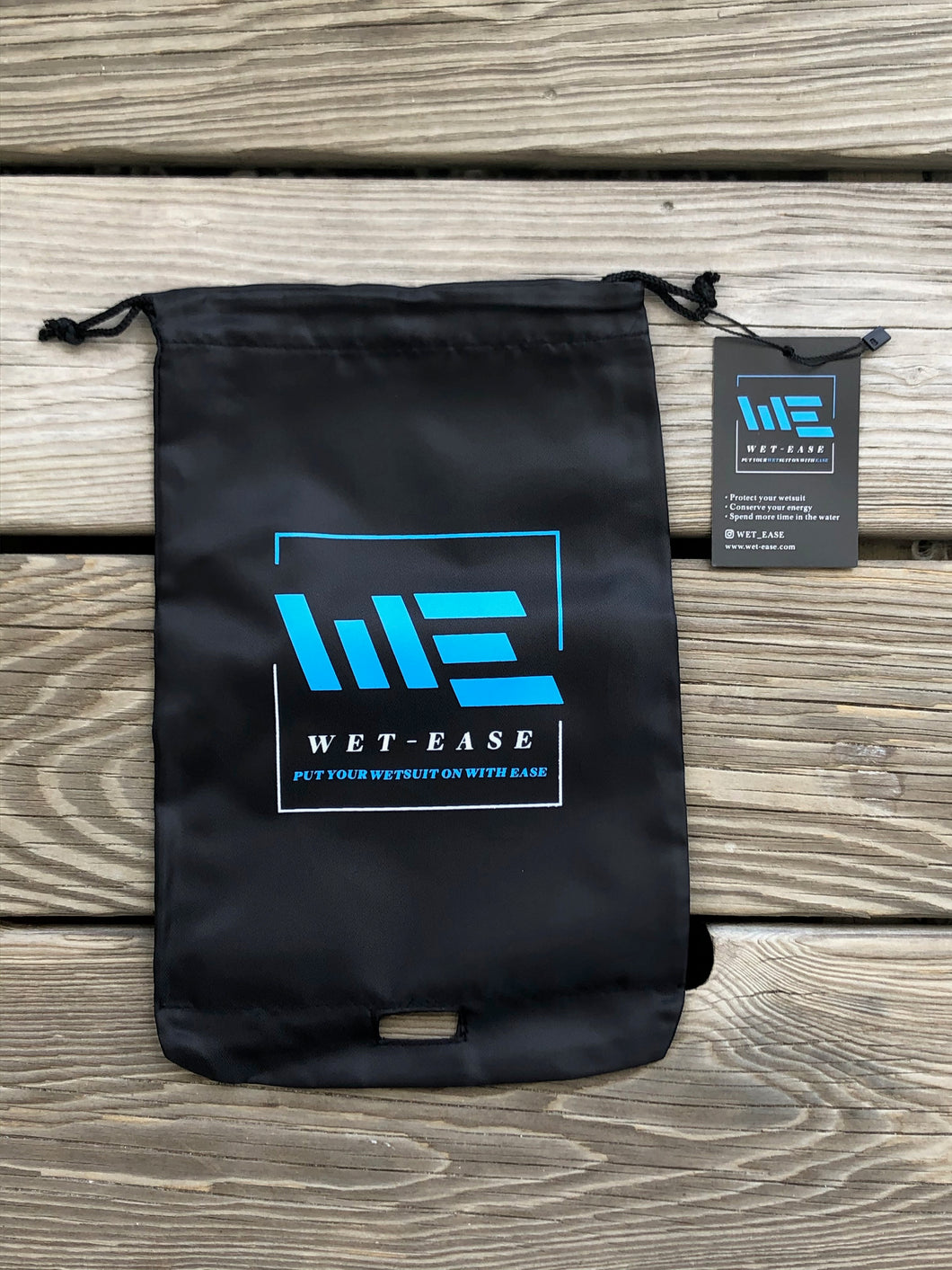 Bag that helps surfers, scuba divers, and triathletes put a wetsuit on with ease